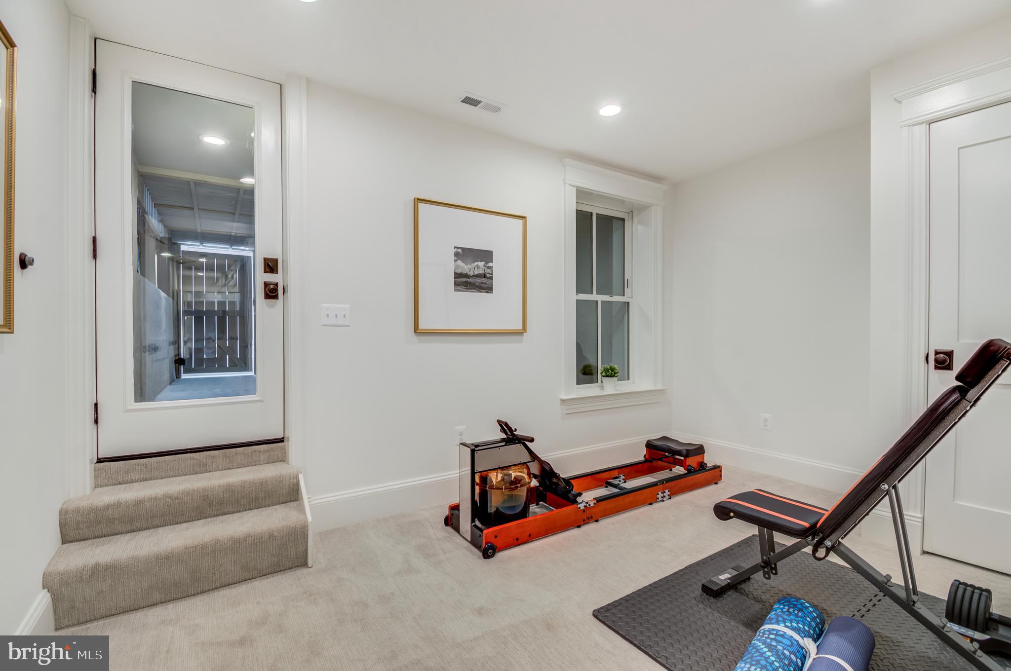 326 D Street Northeast Washington, DC 20002 - Photo 46 of 53 a room with gym equipment