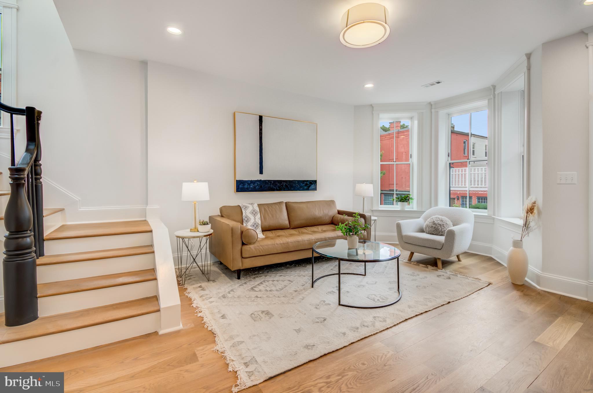 326 D Street Northeast Washington, DC 20002 - Photo 5 of 53 a living room with furniture and a large window