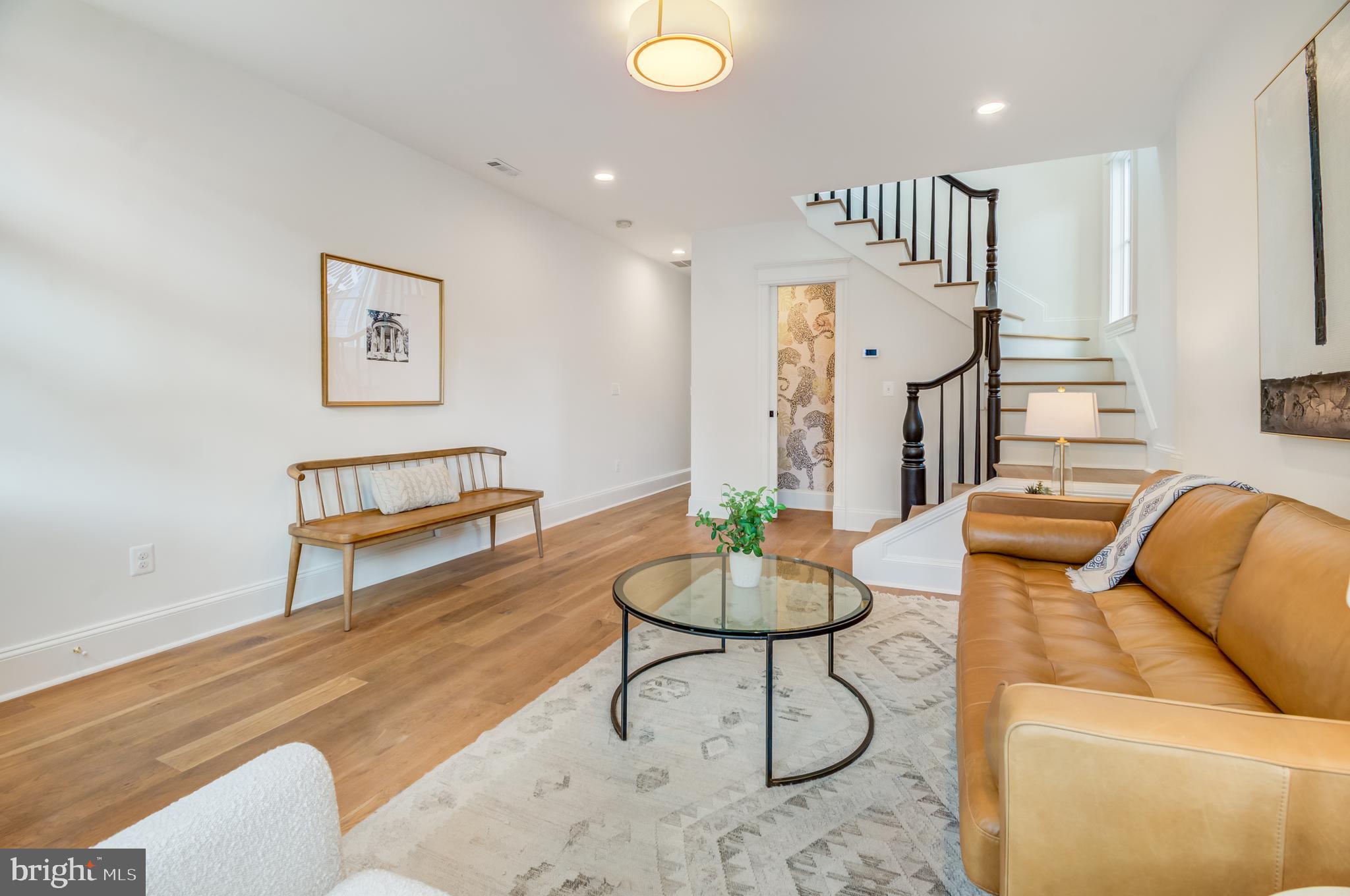 326 D Street Northeast Washington, DC 20002 - Photo 6 of 53 a living room with furniture and kitchen view