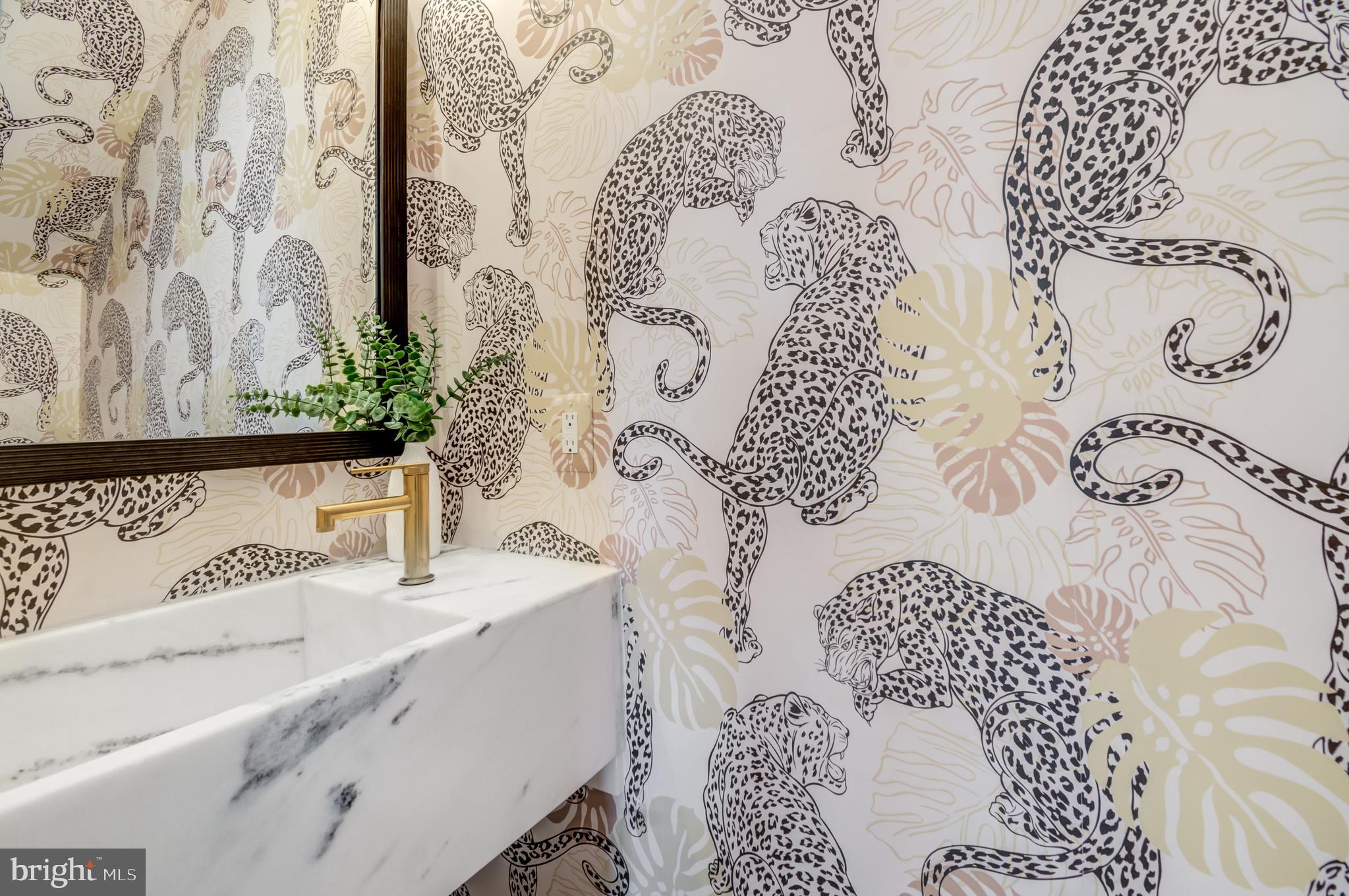 326 D Street Northeast Washington, DC 20002 - Photo 7 of 53 a bathroom with a sink and a curtain