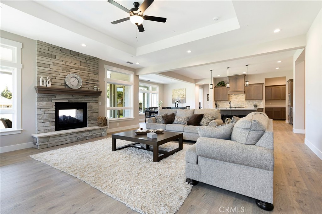 3 Haystack Court Chico, CA 95973 - Photo 13 of 75 a living room with furniture kitchen view and a fireplace