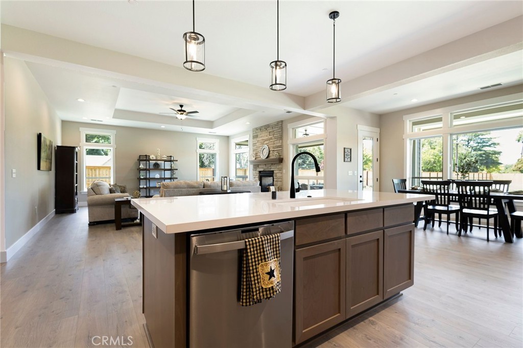 3 Haystack Court Chico, CA 95973 - Photo 26 of 75 a kitchen with center island table and chairs