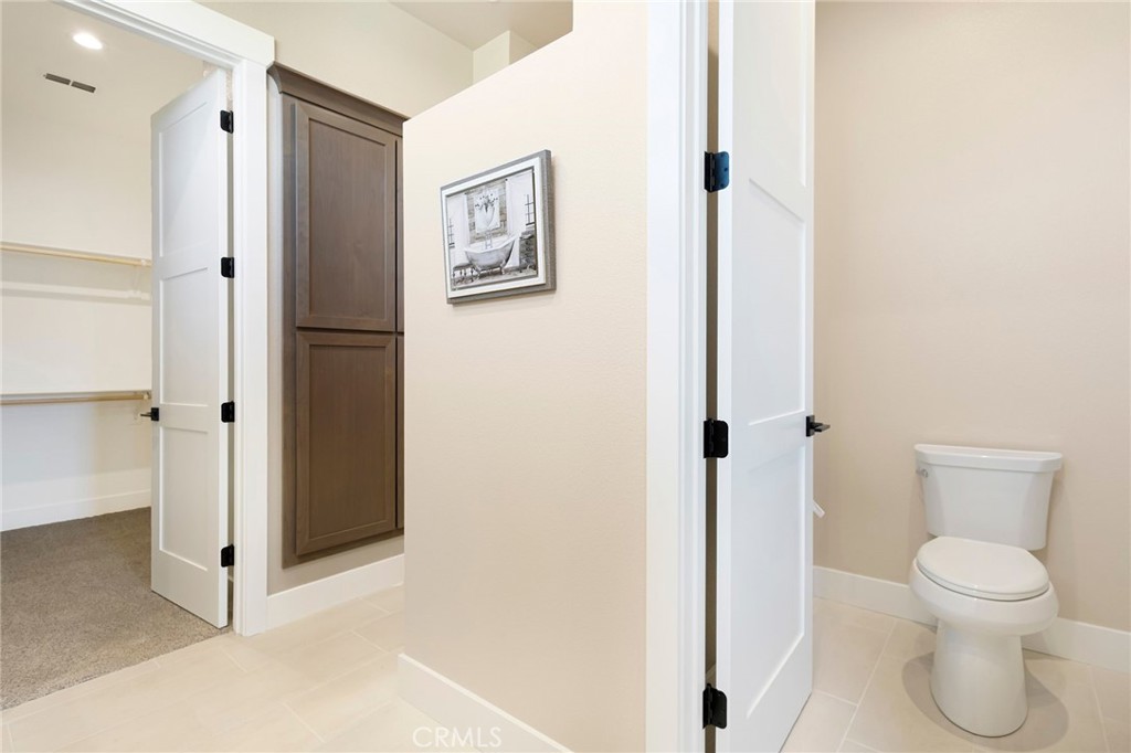 3 Haystack Court Chico, CA 95973 - Photo 34 of 75 a bathroom with a toilet and a shower