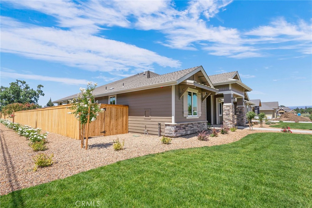 3 Haystack Court Chico, CA 95973 - Photo 4 of 75 a view of a house with backyard and sitting area