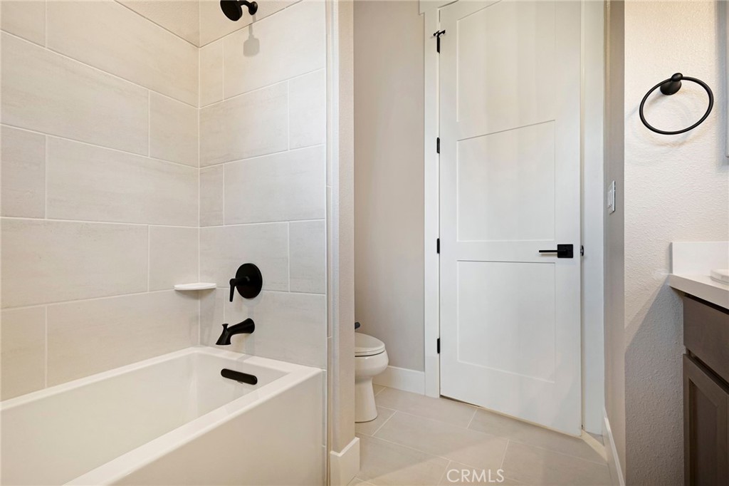 3 Haystack Court Chico, CA 95973 - Photo 45 of 75 a bathroom with a bathtub a toilet and a shower