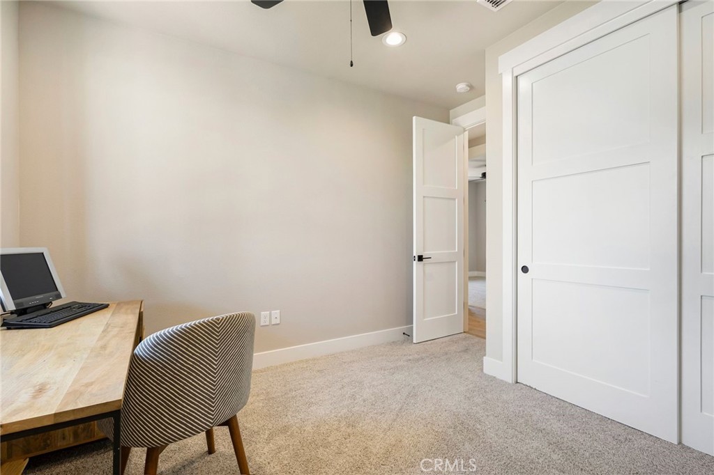 3 Haystack Court Chico, CA 95973 - Photo 47 of 75 a view of a livingroom with furniture and a ceiling fan