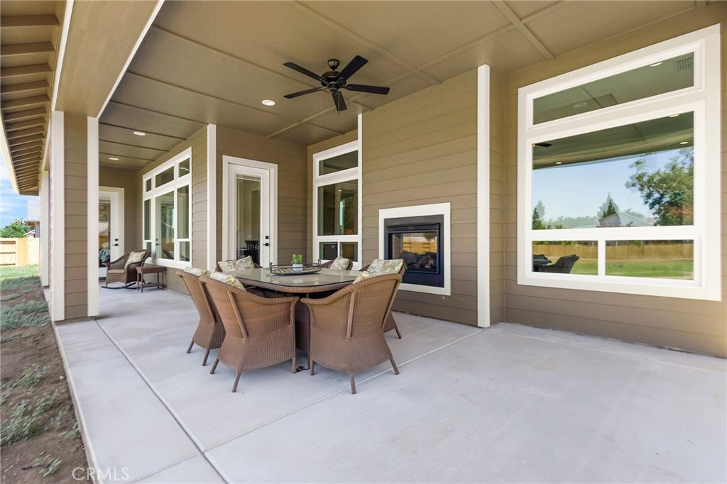 3 Haystack Court Chico, CA 95973 - Photo 55 of 75 a dining room with furniture and a large window