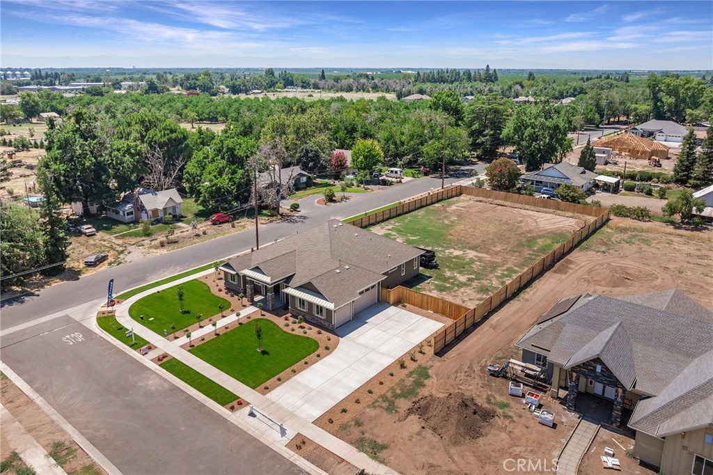 3 Haystack Court Chico, CA 95973 - Photo 67 of 75 an aerial view of a house with a garden and lake view