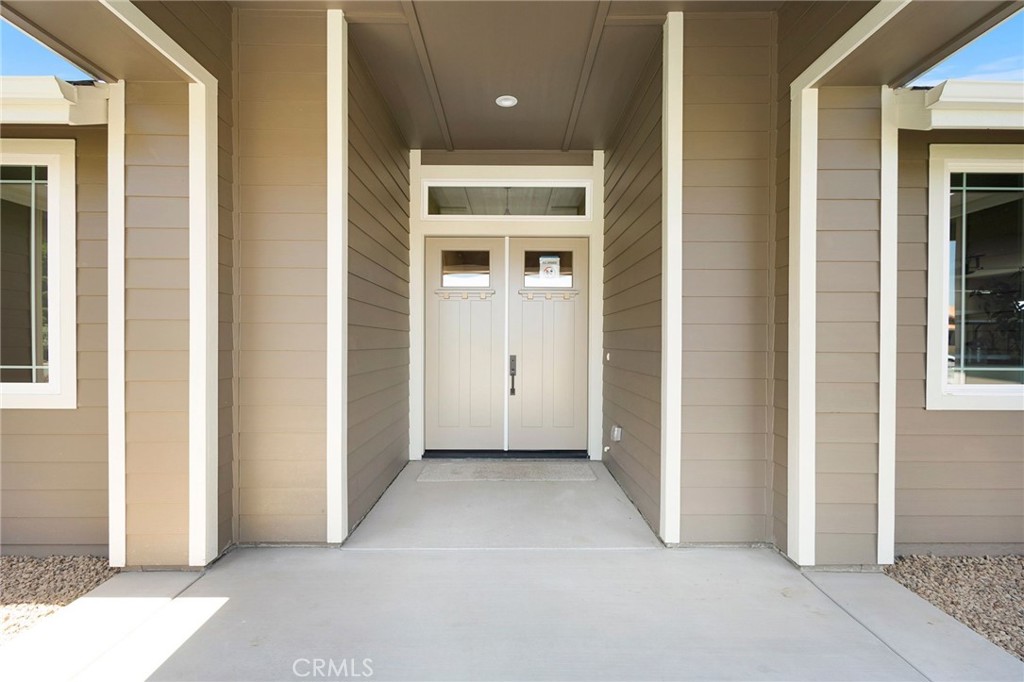 3 Haystack Court Chico, CA 95973 - Photo 8 of 75 a view of a livingroom with a & door and a window