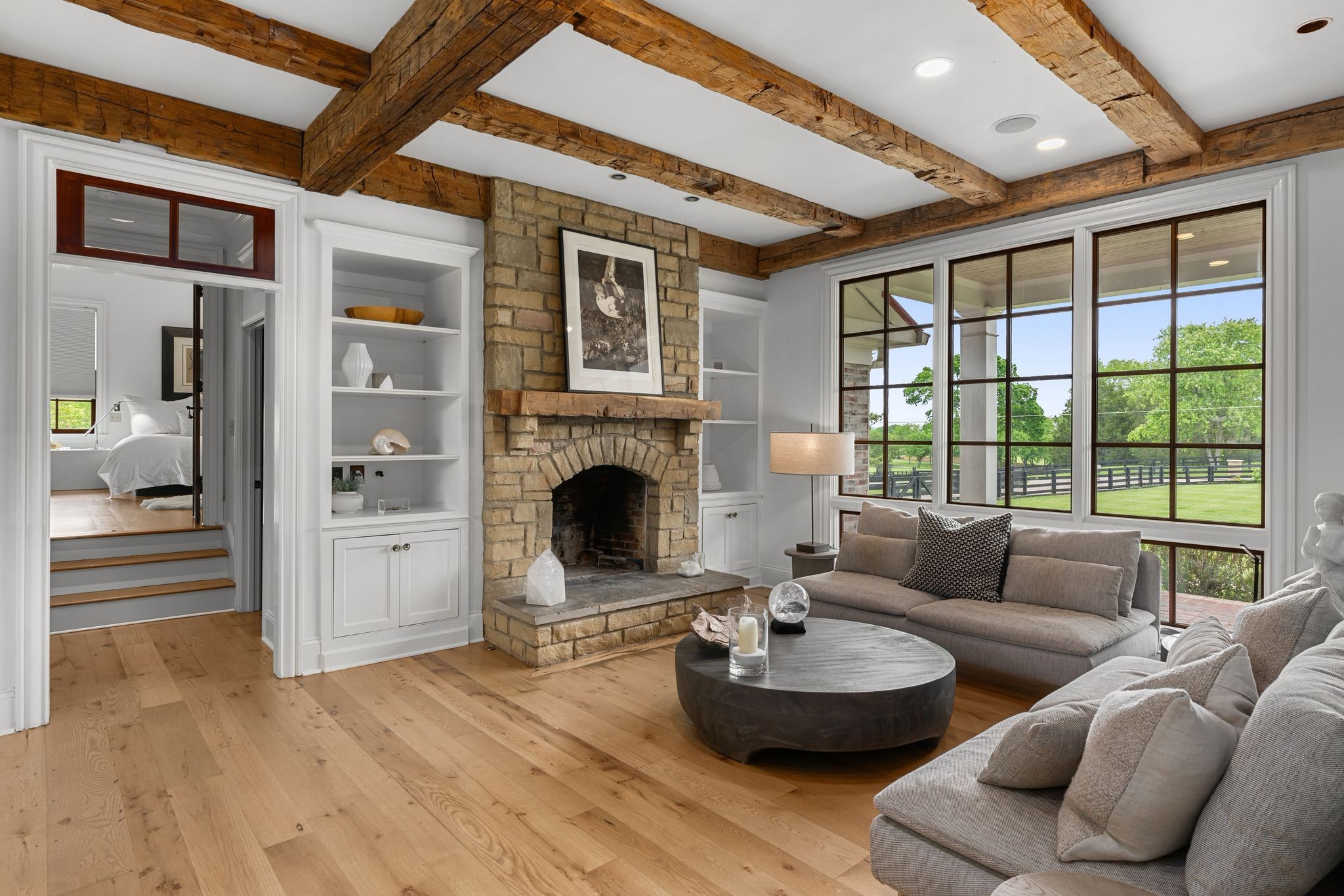 222 Arrowhead Road Franklin, TN 37069 - Photo 13 of 55 a living room with furniture and a fireplace
