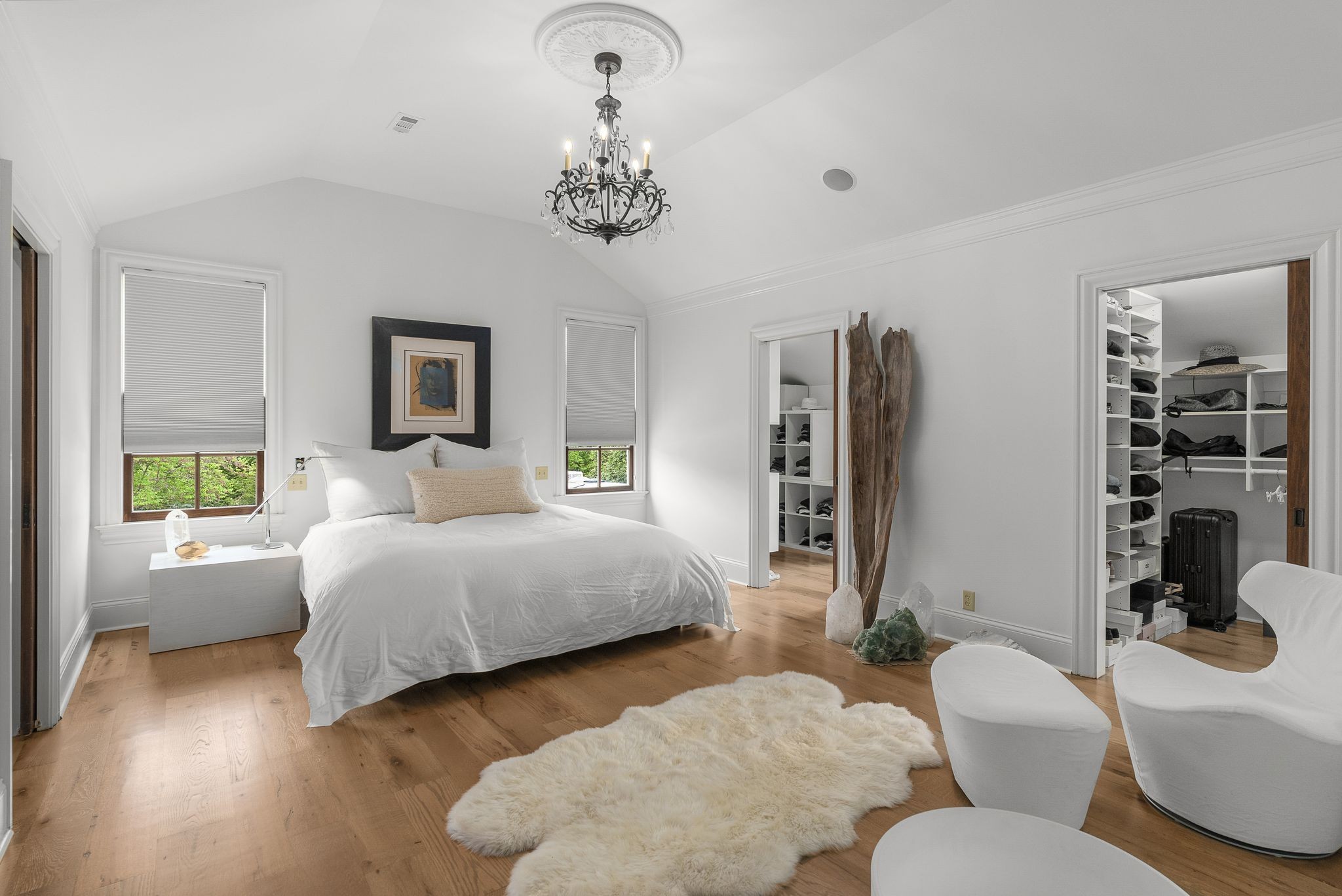 222 Arrowhead Road Franklin, TN 37069 - Photo 14 of 55 a spacious bedroom with two beds and a large mirror with wooden floor