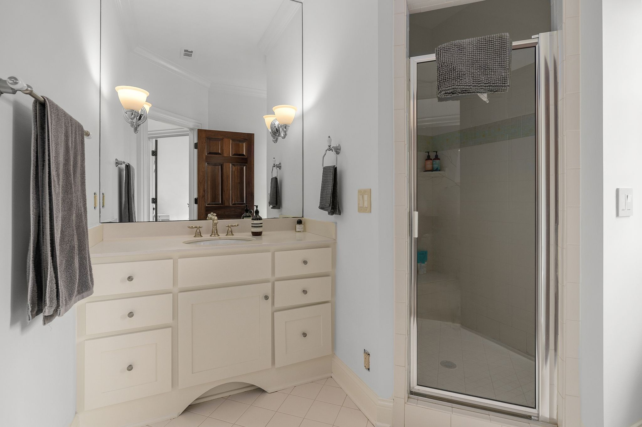 222 Arrowhead Road Franklin, TN 37069 - Photo 25 of 55 a bathroom with a shower sink and mirror