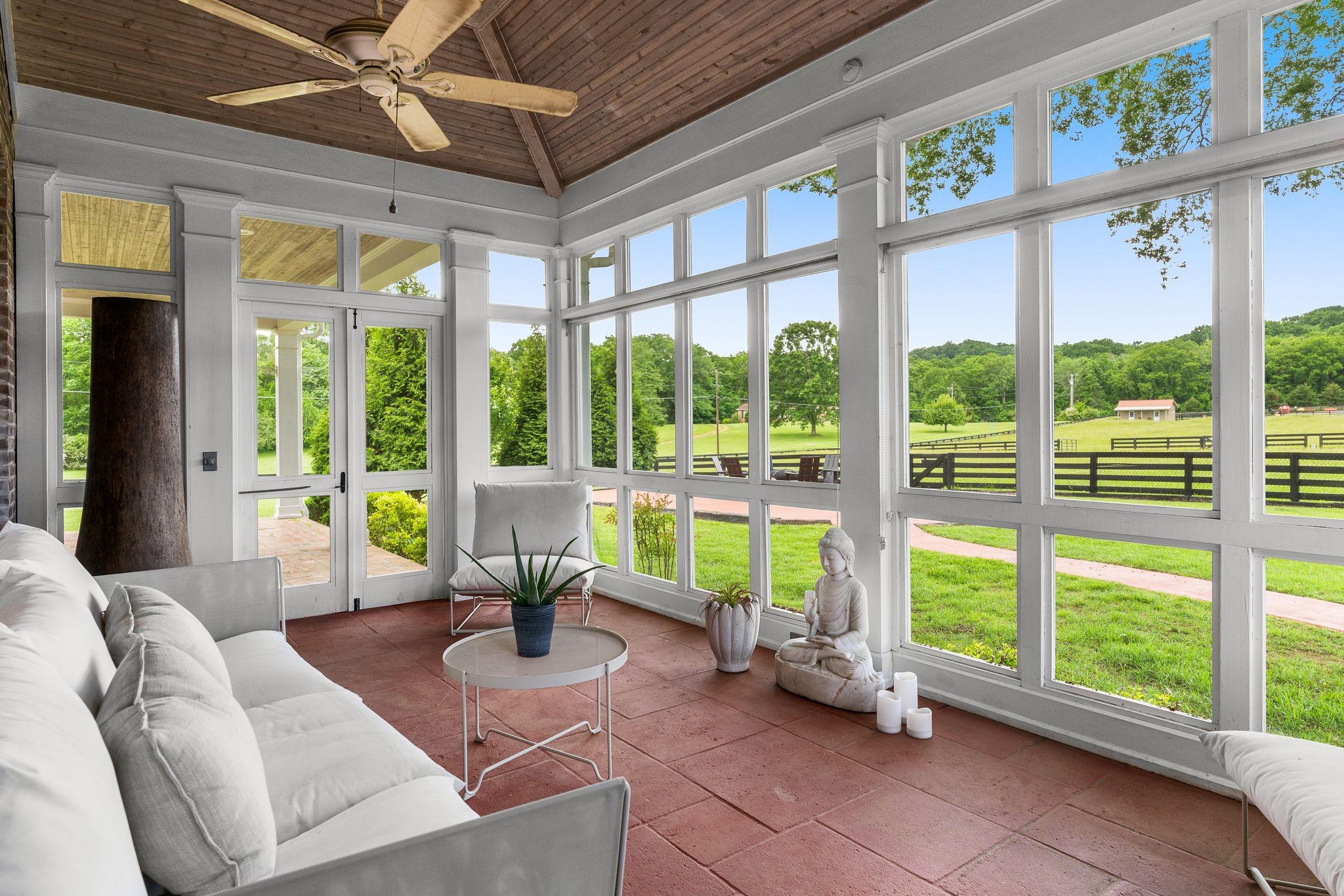 222 Arrowhead Road Franklin, TN 37069 - Photo 29 of 55 a living room with furniture and floor to ceiling windows