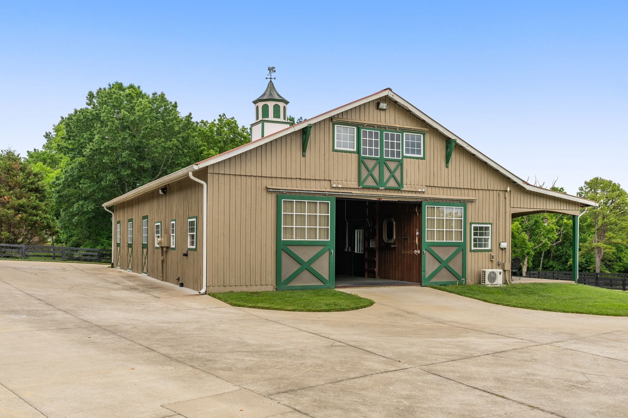 222 Arrowhead Road Franklin, TN 37069 - Photo 37 of 55 a view of a house with a yard and potted plants