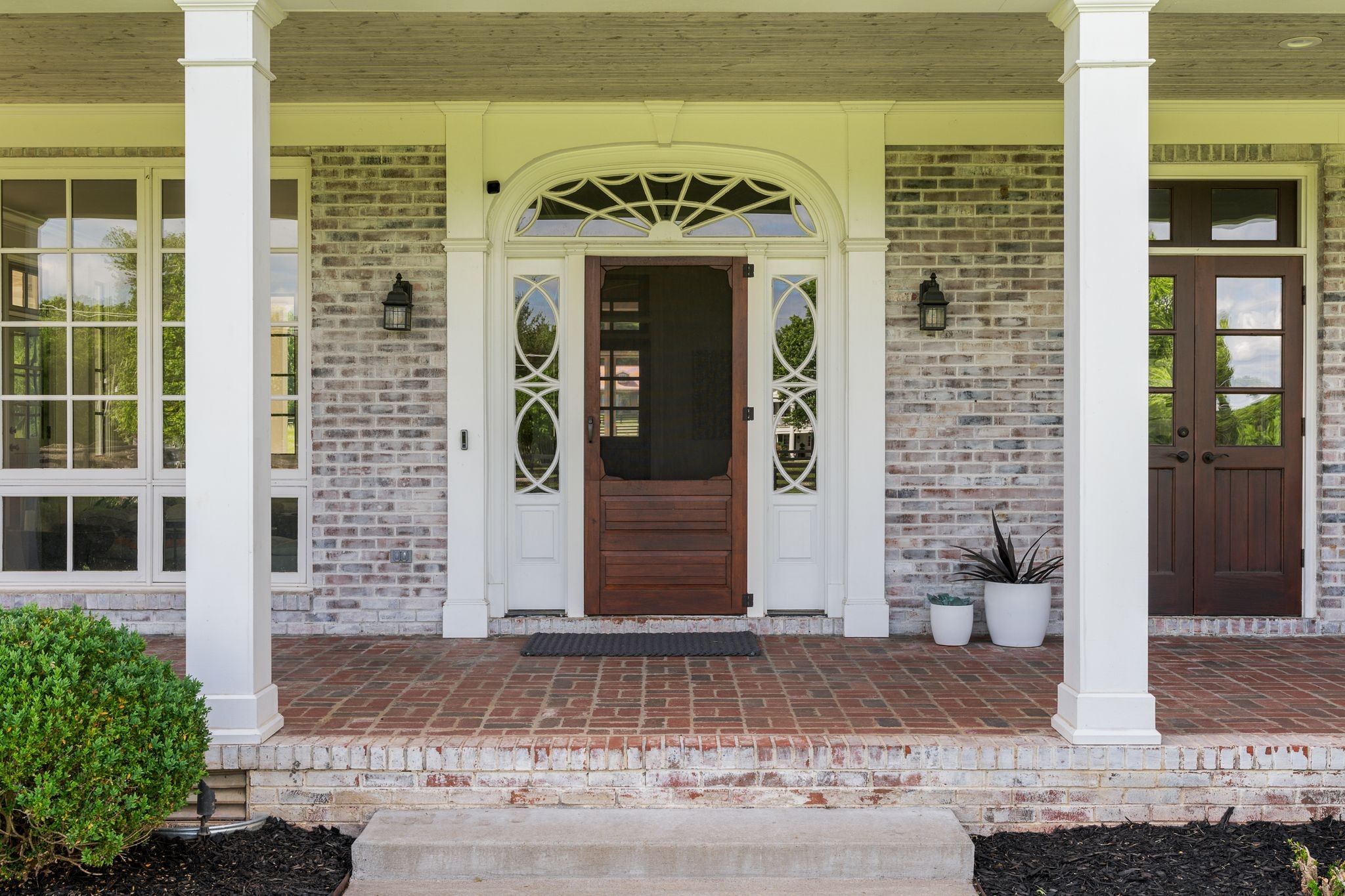 222 Arrowhead Road Franklin, TN 37069 - Photo 4 of 55 a front view of a building with a entrance