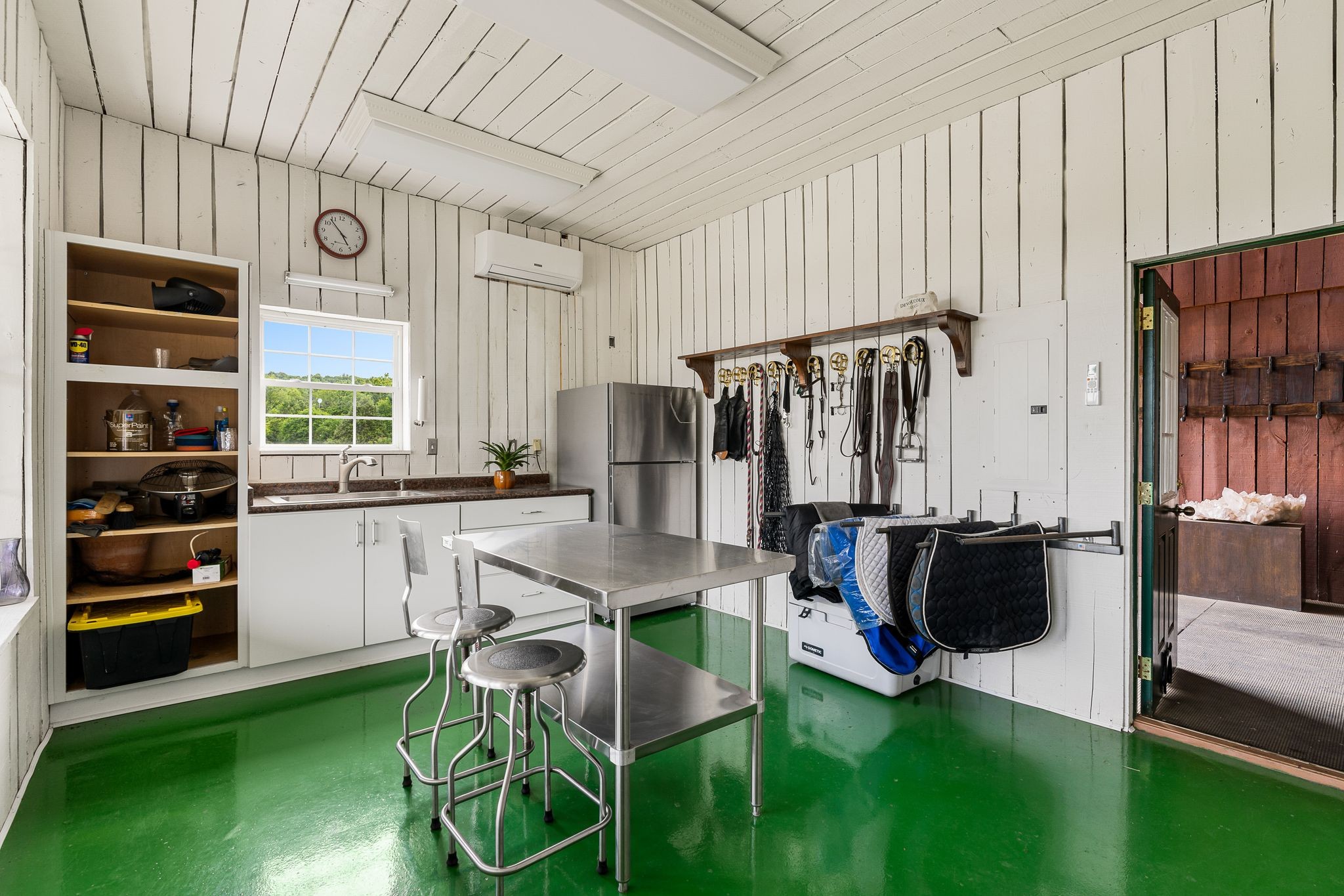 222 Arrowhead Road Franklin, TN 37069 - Photo 46 of 55 a kitchen with a table chairs refrigerator and cabinets