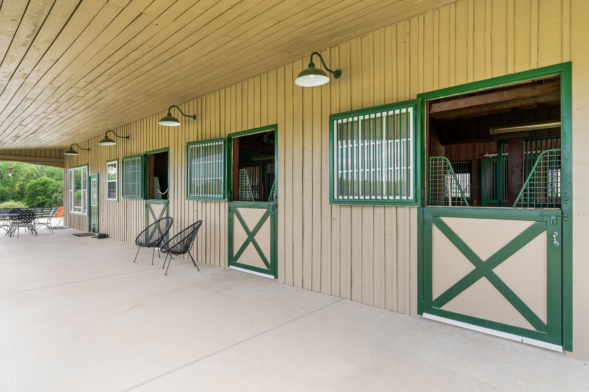 222 Arrowhead Road Franklin, TN 37069 - Photo 48 of 55 a view of an chairs and tables in the patio