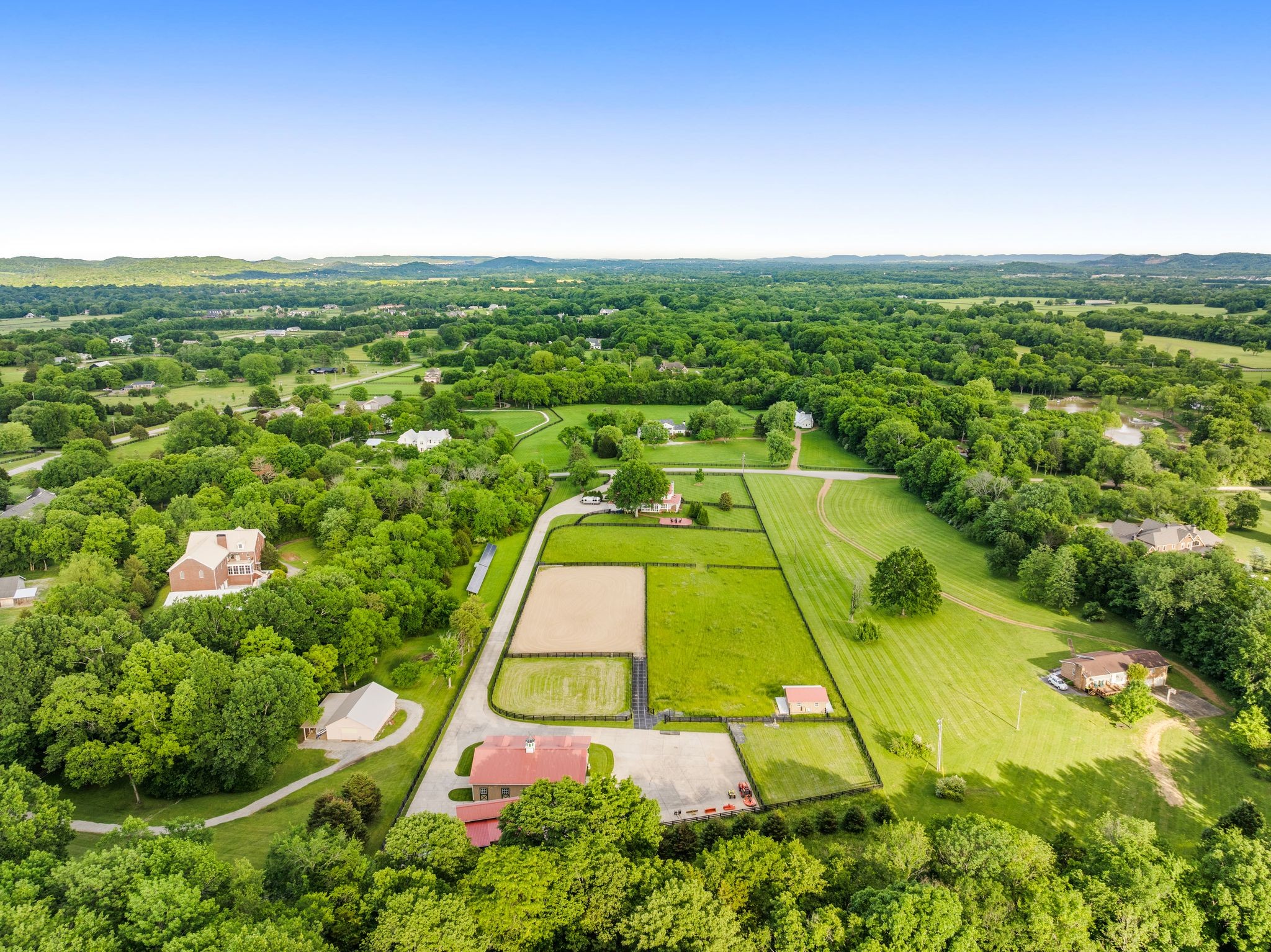 222 Arrowhead Road Franklin, TN 37069 - Photo 53 of 55 an aerial view of residential houses with outdoor space and trees