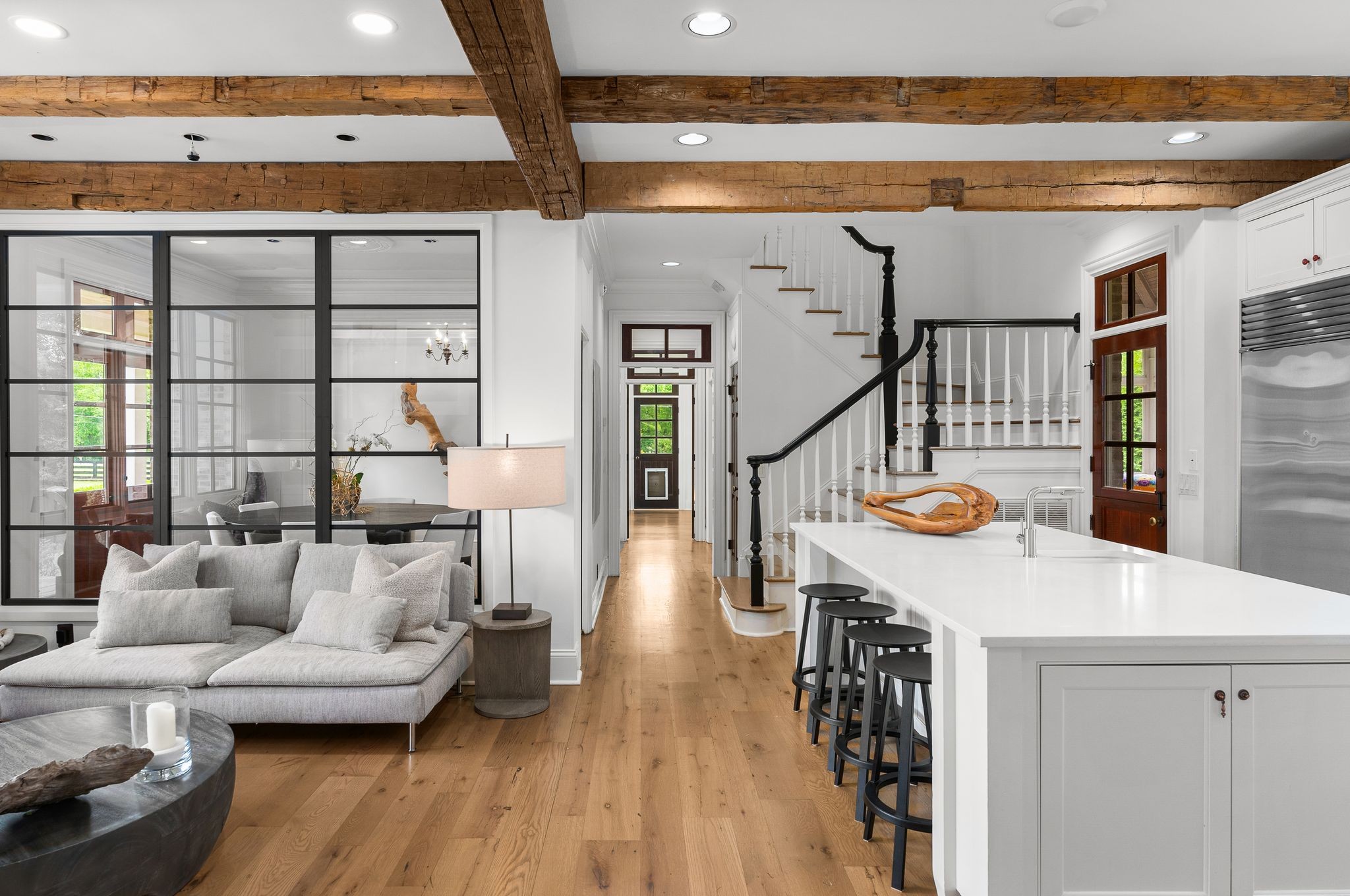 222 Arrowhead Road Franklin, TN 37069 - Photo 8 of 55 a outdoor living space with furniture and wooden floor