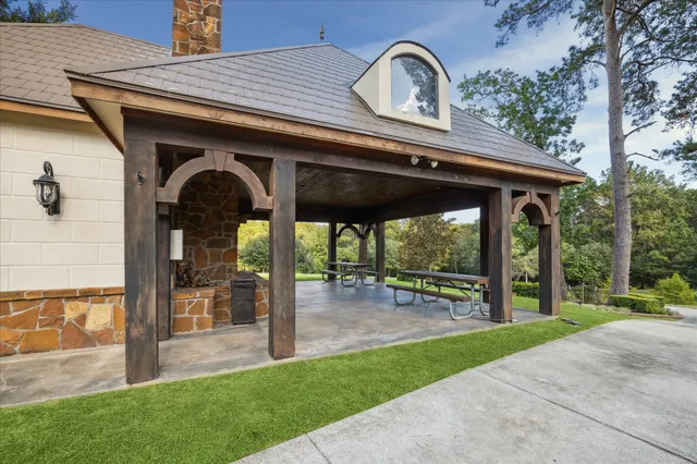 a house with palm trees in the background