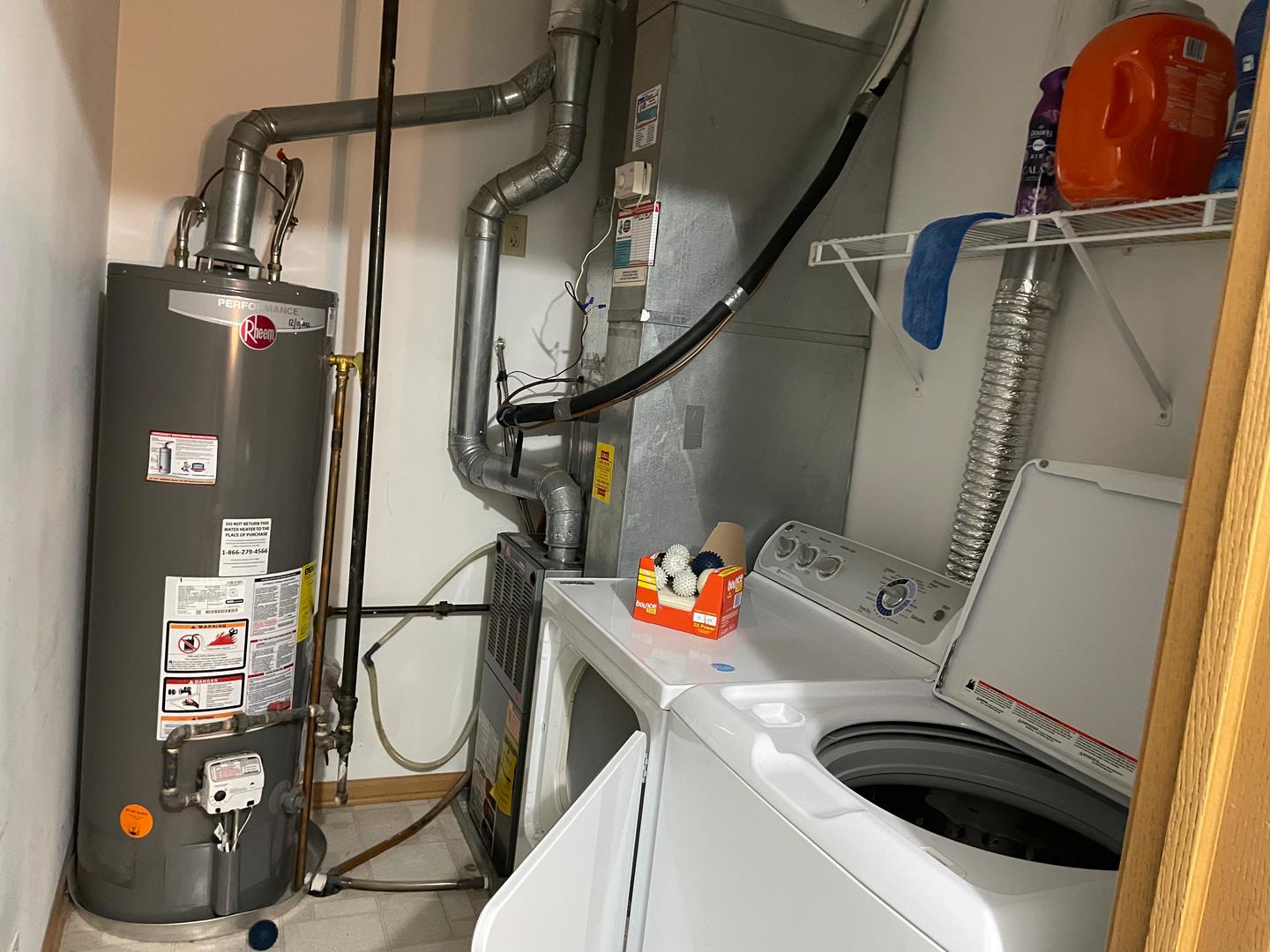 2497 Reflections Drive Aurora, IL 60502 - Photo 19 of 22 a utility room with dryer and washer