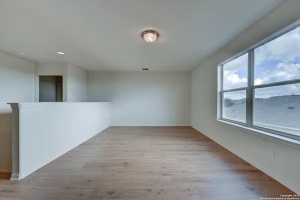 an empty room with windows