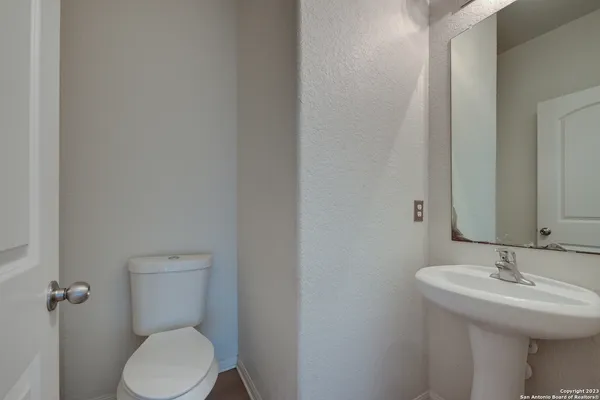 a bathroom with a sink and a toilet