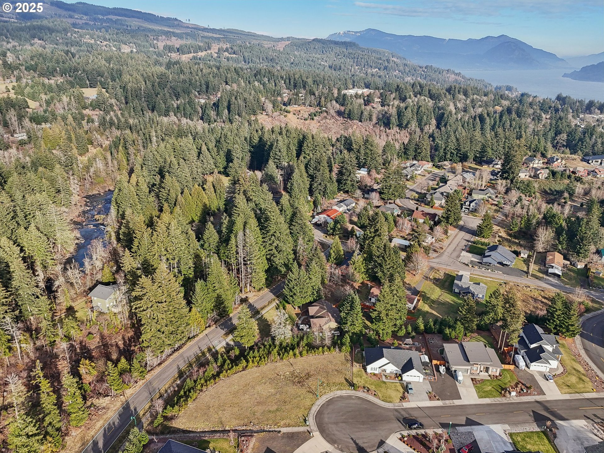 189 Falcon Court Stevenson, WA 98648 - Photo 14 of 14 an aerial view of a house with a yard