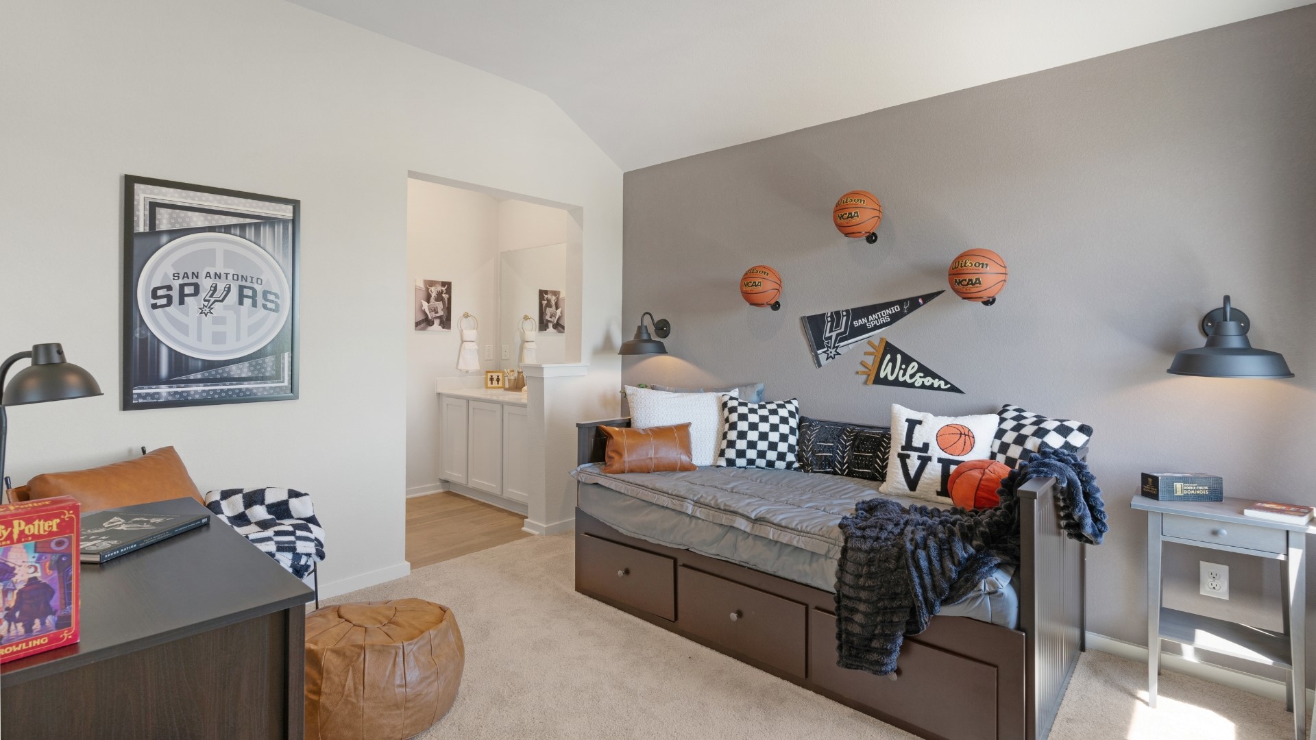 25812 Jasmine Sprig Lane Elgin, TX 78621 - Photo 24 of 33 A well-lit bedroom features vaulted ceilings and plush carpet, perfect for comfortable living.