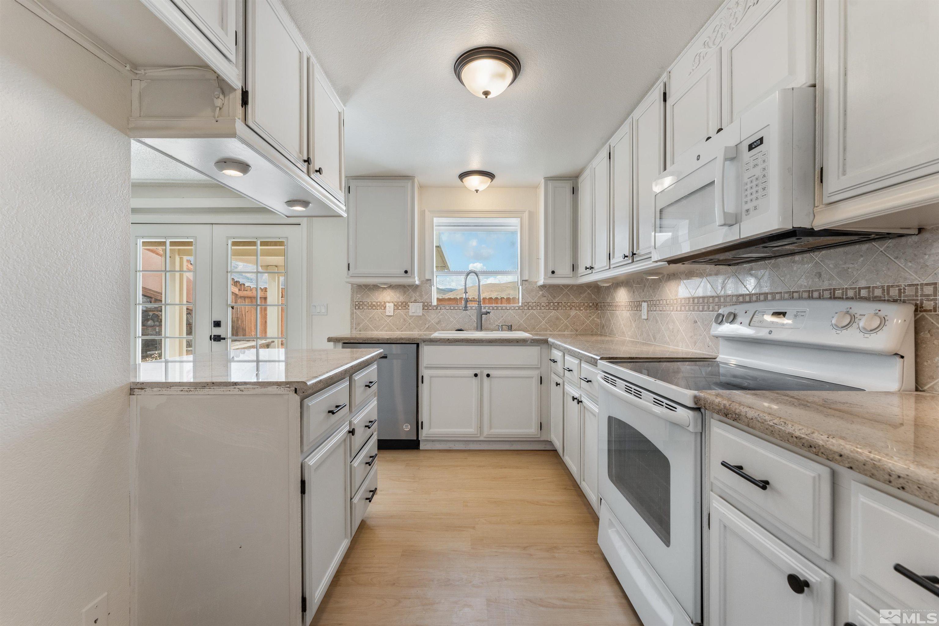 8551 Corrigan Way Reno, NV 89506 - Photo 9 of 35 Photo 9