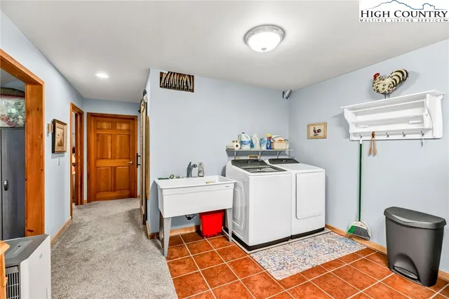 a view of a swimming pool with an outdoor space and seating area