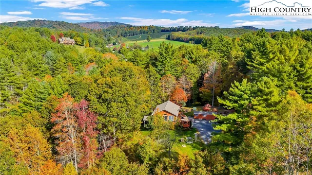 a view of a field with an ocean