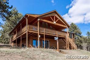 636 Bluebird Drive Bailey, CO 80421 - Photo 2 of 29 a front view of a house
