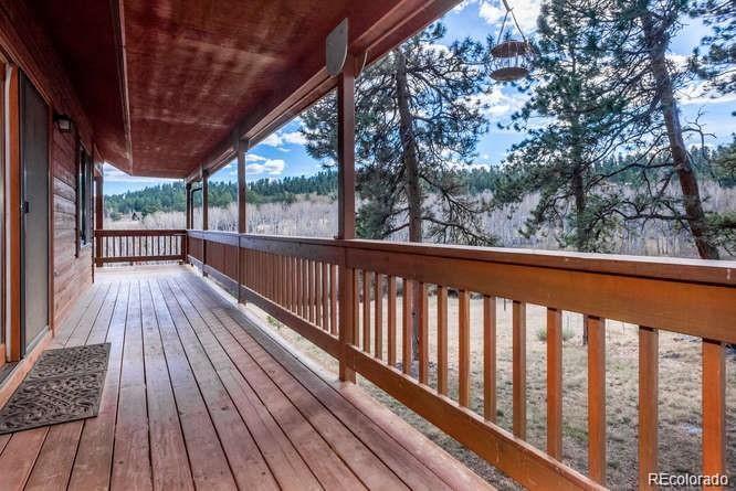 636 Bluebird Drive Bailey, CO 80421 - Photo 3 of 29 a view of balcony with wooden floor