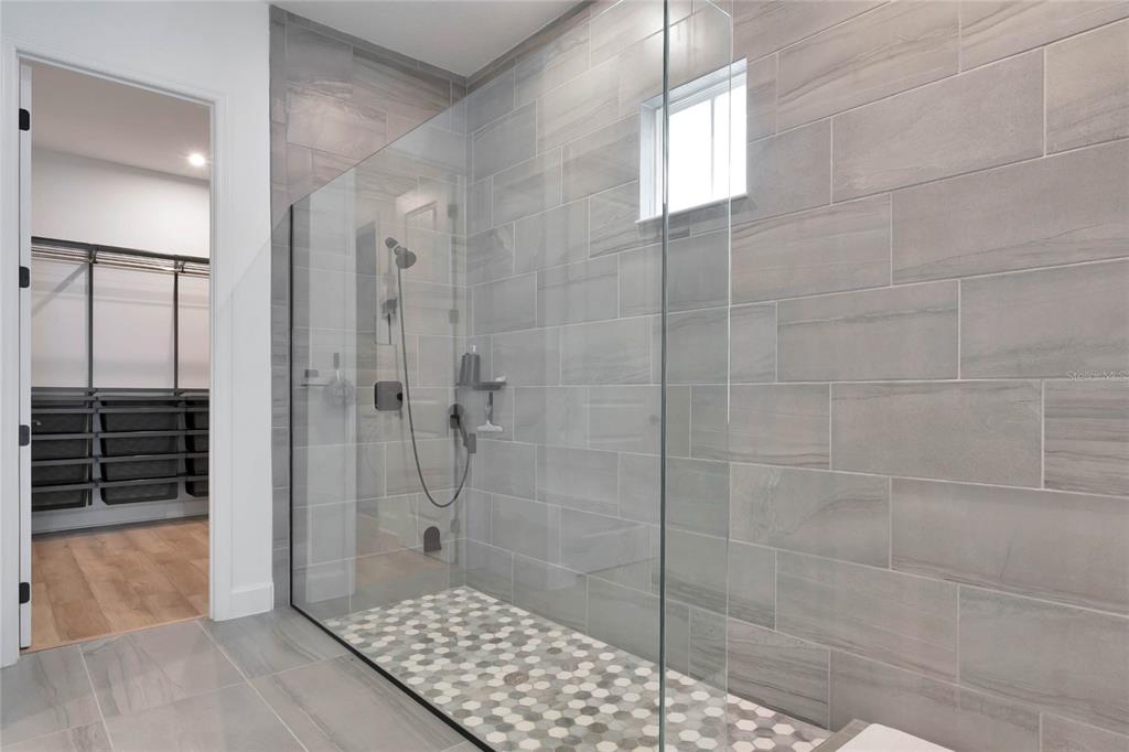 7540 Estuary Lake Loop Celebration, FL 34747 - Photo 13 of 35 a bathroom with a shower