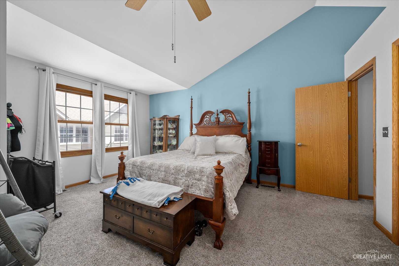 662 South Peace Road Sycamore, IL 60178 - Photo 11 of 17 a bedroom with a bed couch and a flat tv screen