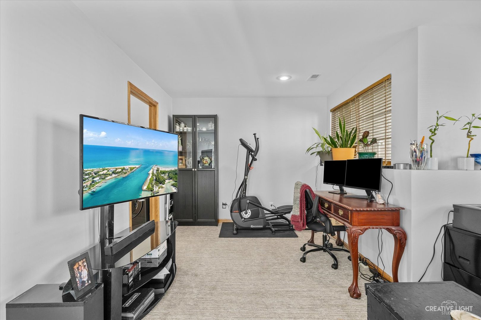 662 South Peace Road Sycamore, IL 60178 - Photo 14 of 17 a view of a workspace with furniture and a potted plant