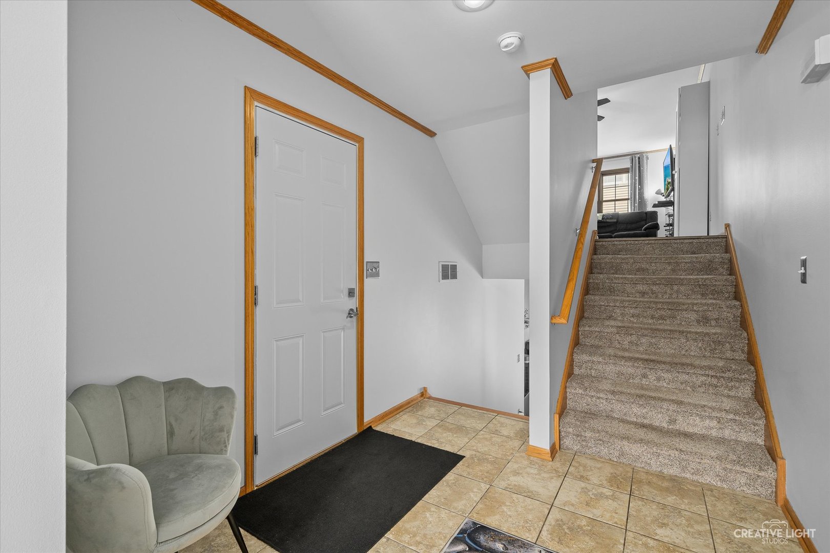 662 South Peace Road Sycamore, IL 60178 - Photo 2 of 17 a living room with furniture and a rug