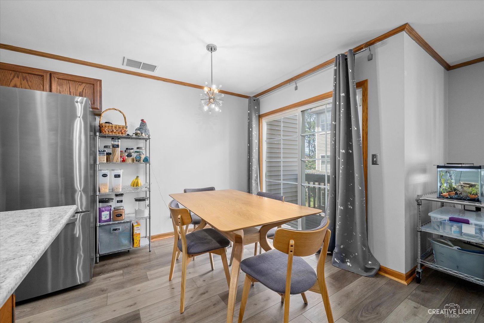 662 South Peace Road Sycamore, IL 60178 - Photo 5 of 17 a view of a dining room with furniture window and wooden floor