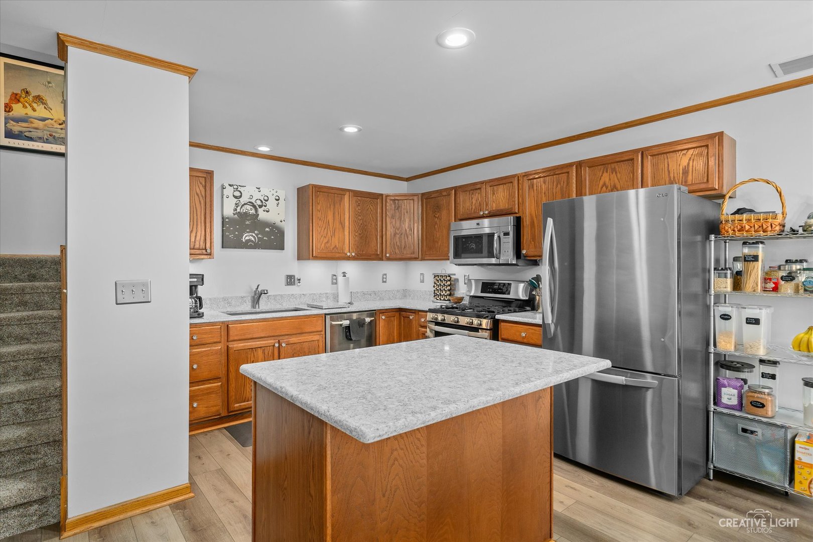 662 South Peace Road Sycamore, IL 60178 - Photo 6 of 17 a kitchen with stainless steel appliances a refrigerator and a stove top oven