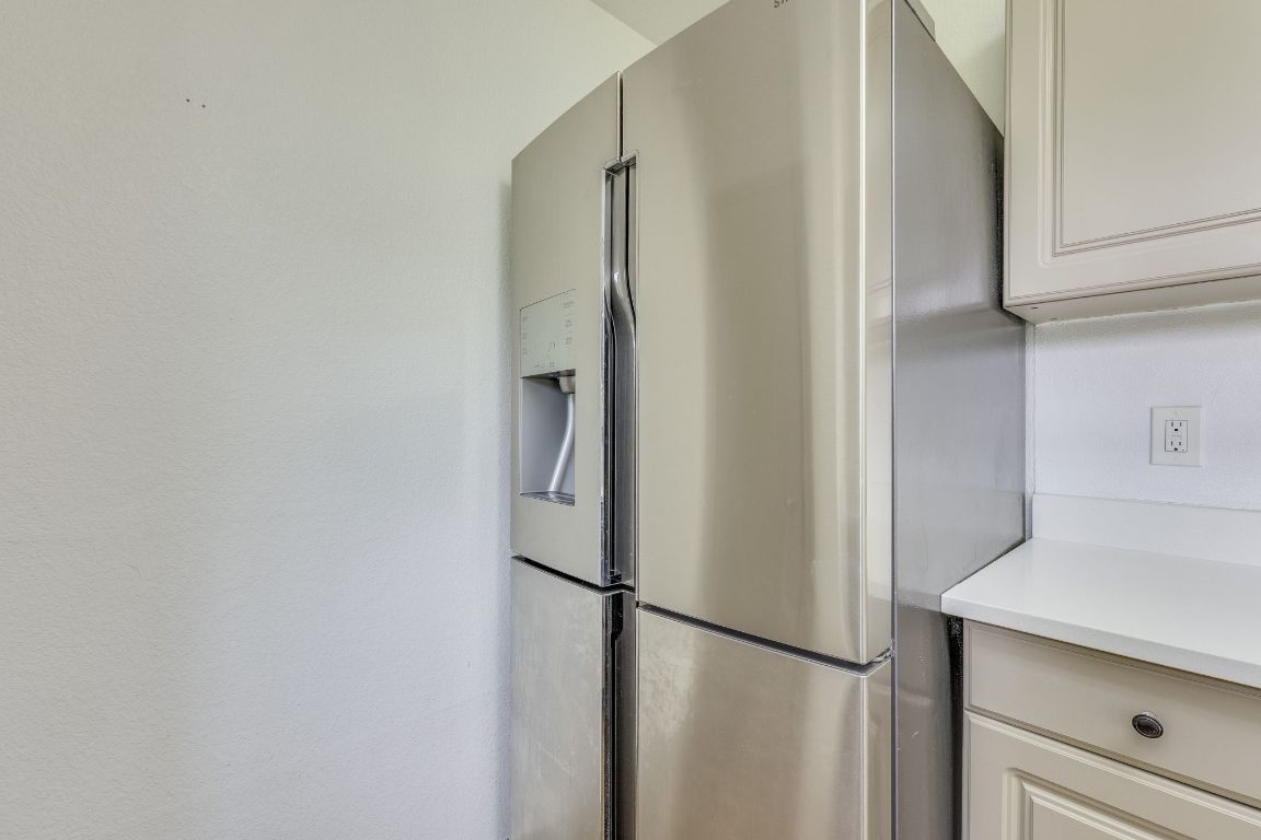 1416 Atterbury Lane Austin, TX 78754 - Photo 14 of 24 a view of walk in closet with empty racks