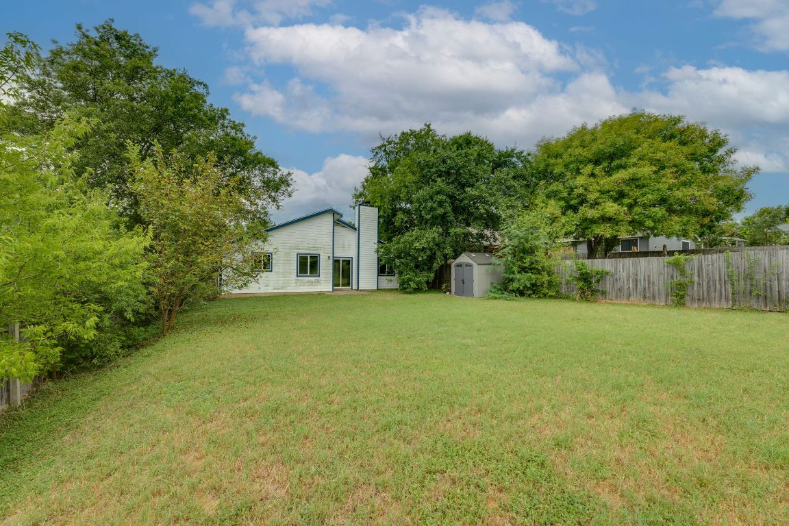 1416 Atterbury Lane Austin, TX 78754 - Photo 24 of 24 a house view with a garden space