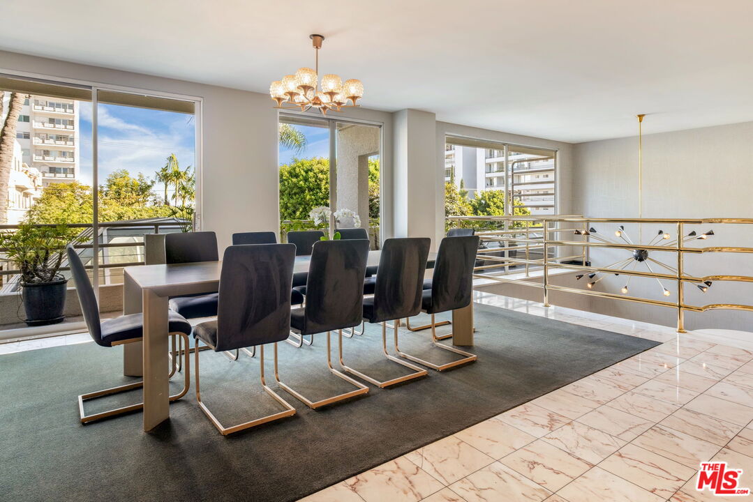 1131 Alta Loma Road, Unit 116 West Hollywood, CA 90069 - Photo 22 of 25 a view of a dining room with furniture