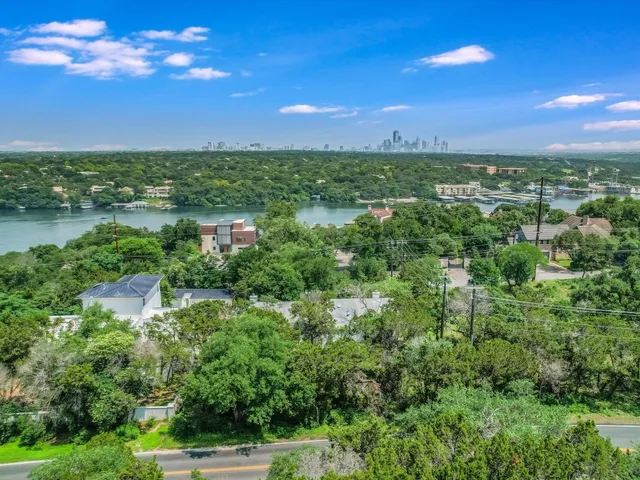 a view of a lake with a city