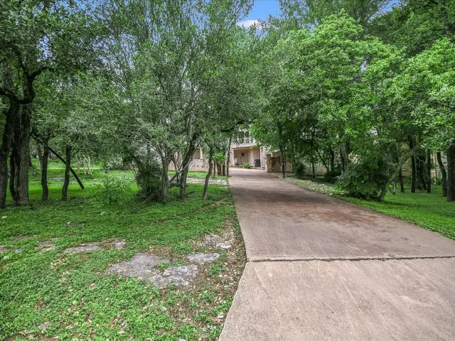 a view of backyard with green space
