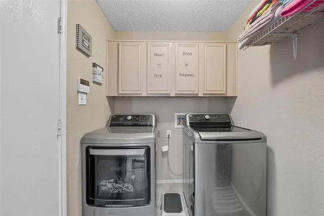 a bathroom with a sink double vanity and a mirror