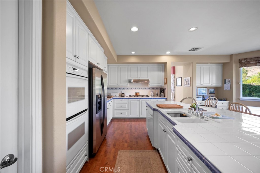 3262 Bluebird Circle Simi Valley, CA 93063 - Photo 15 of 43 a large kitchen with a lot of counter space
