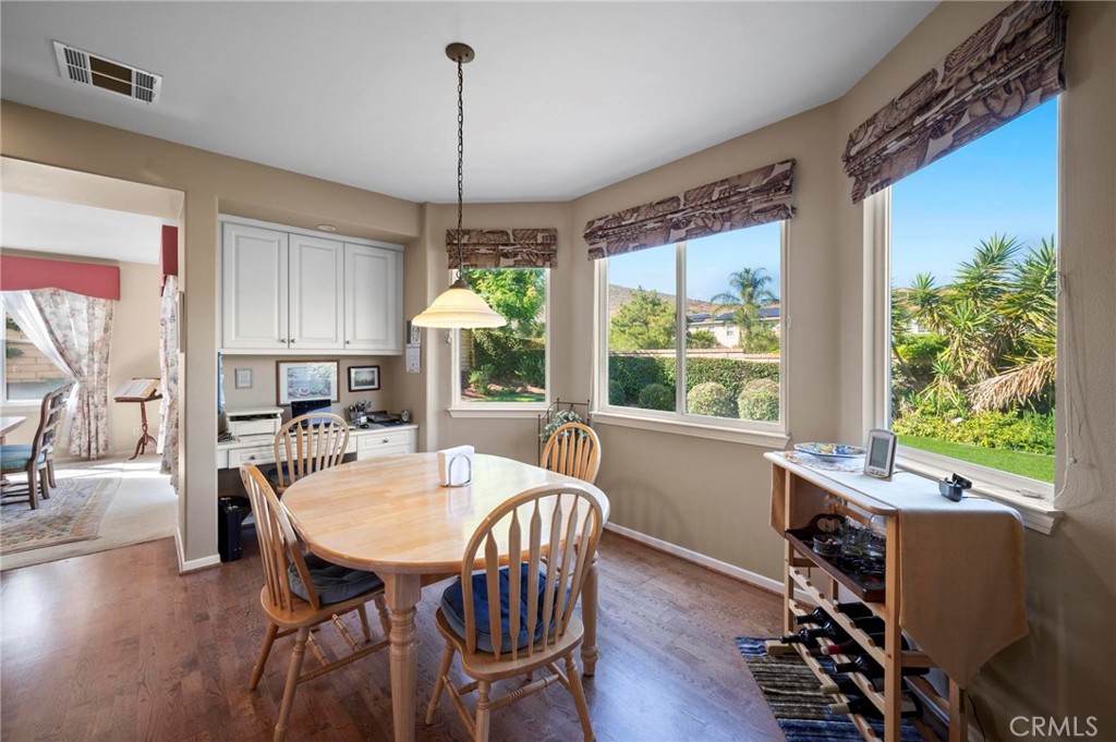 3262 Bluebird Circle Simi Valley, CA 93063 - Photo 16 of 43 a dining room with furniture window wooden floor