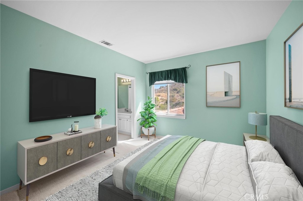 3262 Bluebird Circle Simi Valley, CA 93063 - Photo 21 of 43 a bedroom with a bed and a flat screen tv