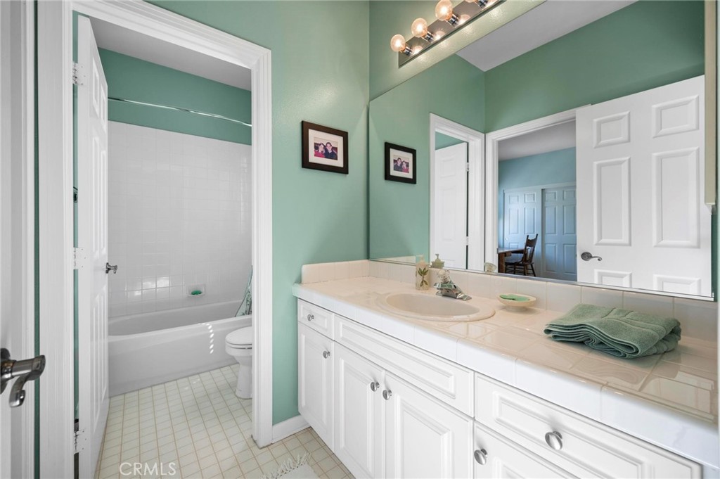 3262 Bluebird Circle Simi Valley, CA 93063 - Photo 22 of 43 a bathroom with a sink a toilet and shower
